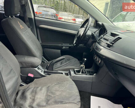 Серый Мицубиси Лансер, объемом двигателя 1.5 л и пробегом 239 тыс. км за 6000 $, фото 14 на Automoto.ua