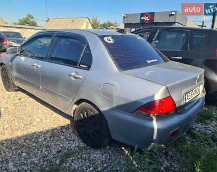 Сірий Міцубісі Lancer, об'ємом двигуна 1.6 л та пробігом 240 тис. км за 2999 $, фото 5 на Automoto.ua