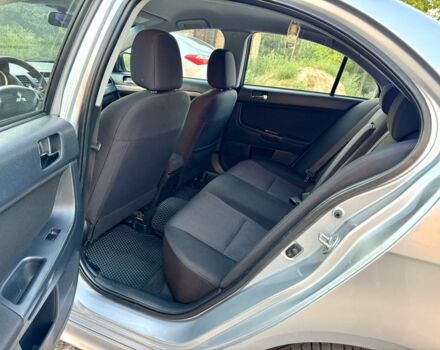 Серый Мицубиси Лансер, объемом двигателя 2 л и пробегом 223 тыс. км за 6890 $, фото 12 на Automoto.ua