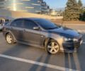 Сірий Міцубісі Lancer, об'ємом двигуна 2 л та пробігом 220 тис. км за 7500 $, фото 1 на Automoto.ua