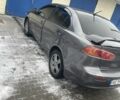 Сірий Міцубісі Lancer, об'ємом двигуна 1.5 л та пробігом 201 тис. км за 7000 $, фото 2 на Automoto.ua