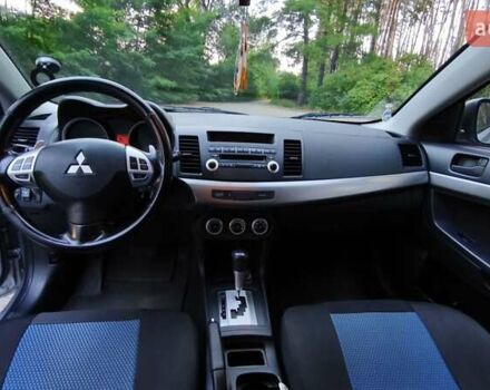 Міцубісі Lancer 2008 у Києві на Automoto.ua Сірий Міцубісі Lancer, об'ємом двигуна 2 л та пробігом 175 тис. км за 8200 $, фото 23 на Automoto.ua