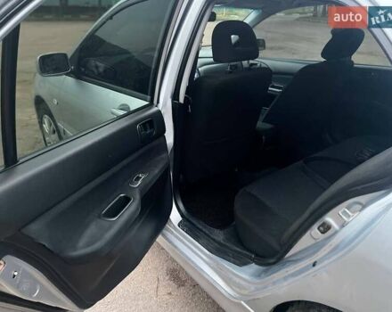 Сірий Міцубісі Lancer, об'ємом двигуна 1.6 л та пробігом 254 тис. км за 3800 $, фото 12 на Automoto.ua