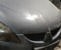 Серый Мицубиси Лансер, объемом двигателя 1 л и пробегом 126 тыс. км за 5500 $, фото 1 на Automoto.ua
