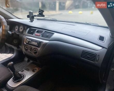 Сірий Міцубісі Lancer, об'ємом двигуна 1.6 л та пробігом 250 тис. км за 3500 $, фото 9 на Automoto.ua