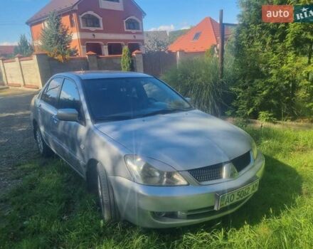Сірий Міцубісі Lancer, об'ємом двигуна 1.6 л та пробігом 290 тис. км за 3850 $, фото 7 на Automoto.ua