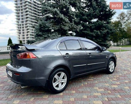 Серый Мицубиси Лансер, объемом двигателя 2 л и пробегом 212 тыс. км за 6000 $, фото 12 на Automoto.ua