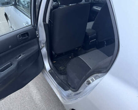 Серый Мицубиси Лансер, объемом двигателя 1.58 л и пробегом 330 тыс. км за 3500 $, фото 10 на Automoto.ua