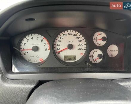 Серый Мицубиси Лансер, объемом двигателя 1.58 л и пробегом 146 тыс. км за 5490 $, фото 19 на Automoto.ua