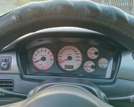Серый Мицубиси Лансер, объемом двигателя 1.6 л и пробегом 234 тыс. км за 4300 $, фото 5 на Automoto.ua