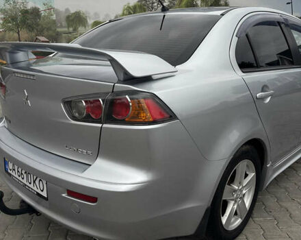 Серый Мицубиси Лансер, объемом двигателя 2 л и пробегом 211 тыс. км за 7100 $, фото 2 на Automoto.ua