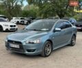 Серый Мицубиси Лансер, объемом двигателя 2 л и пробегом 252 тыс. км за 5900 $, фото 1 на Automoto.ua