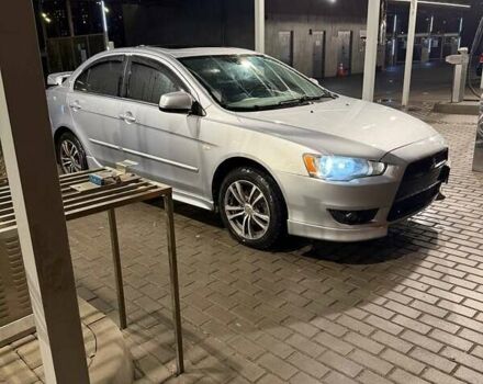 Серый Мицубиси Лансер, объемом двигателя 1.5 л и пробегом 306 тыс. км за 5750 $, фото 1 на Automoto.ua