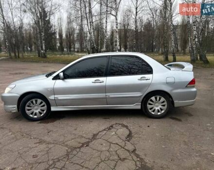 Сірий Міцубісі Lancer, об'ємом двигуна 1.6 л та пробігом 254 тис. км за 3800 $, фото 7 на Automoto.ua