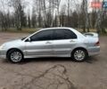 Сірий Міцубісі Lancer, об'ємом двигуна 1.6 л та пробігом 254 тис. км за 3800 $, фото 7 на Automoto.ua