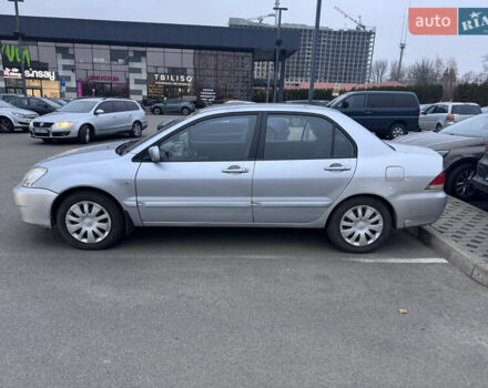 Серый Мицубиси Лансер, объемом двигателя 1.58 л и пробегом 330 тыс. км за 3500 $, фото 21 на Automoto.ua