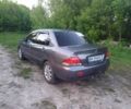 Сірий Міцубісі Lancer, об'ємом двигуна 0.16 л та пробігом 146 тис. км за 5500 $, фото 1 на Automoto.ua