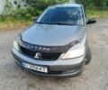 Сірий Міцубісі Lancer, об'ємом двигуна 1.6 л та пробігом 314 тис. км за 4254 $, фото 1 на Automoto.ua