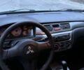 Сірий Міцубісі Lancer, об'ємом двигуна 1.6 л та пробігом 180 тис. км за 3900 $, фото 5 на Automoto.ua