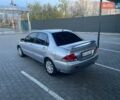 Серый Мицубиси Лансер, объемом двигателя 1.58 л и пробегом 176 тыс. км за 5450 $, фото 10 на Automoto.ua