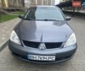 Сірий Міцубісі Lancer, об'ємом двигуна 1.6 л та пробігом 250 тис. км за 3500 $, фото 1 на Automoto.ua