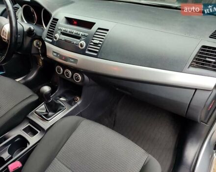 Серый Мицубиси Лансер, объемом двигателя 2 л и пробегом 234 тыс. км за 7200 $, фото 17 на Automoto.ua