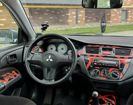 Сірий Міцубісі Lancer, об'ємом двигуна 1.6 л та пробігом 269 тис. км за 3999 $, фото 21 на Automoto.ua