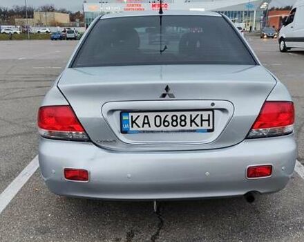Серый Мицубиси Лансер, объемом двигателя 1.58 л и пробегом 216 тыс. км за 4700 $, фото 13 на Automoto.ua