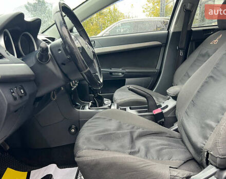 Серый Мицубиси Лансер, объемом двигателя 1.5 л и пробегом 239 тыс. км за 6000 $, фото 9 на Automoto.ua