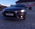 Сірий Міцубісі Lancer, об'ємом двигуна 2 л та пробігом 298 тис. км за 0 $, фото 18 на Automoto.ua