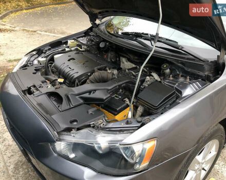 Сірий Міцубісі Lancer, об'ємом двигуна 2 л та пробігом 187 тис. км за 8000 $, фото 14 на Automoto.ua