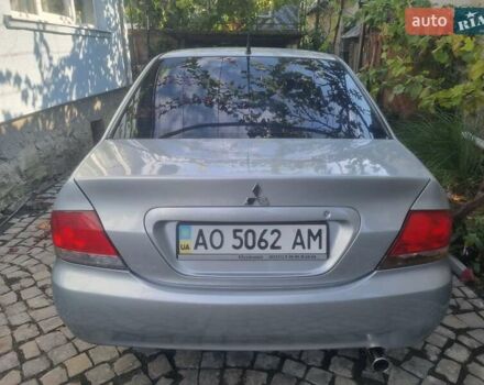 Сірий Міцубісі Lancer, об'ємом двигуна 1.6 л та пробігом 290 тис. км за 3850 $, фото 14 на Automoto.ua