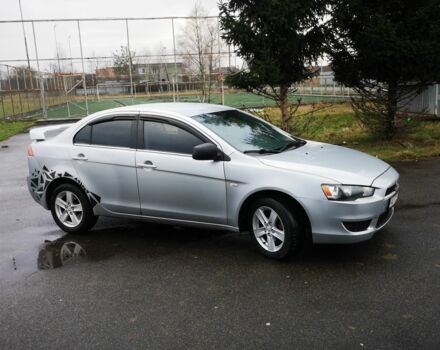 Серый Мицубиси Лансер, объемом двигателя 2 л и пробегом 260 тыс. км за 5200 $, фото 4 на Automoto.ua