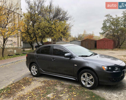 Сірий Міцубісі Lancer, об'ємом двигуна 2 л та пробігом 187 тис. км за 8000 $, фото 4 на Automoto.ua