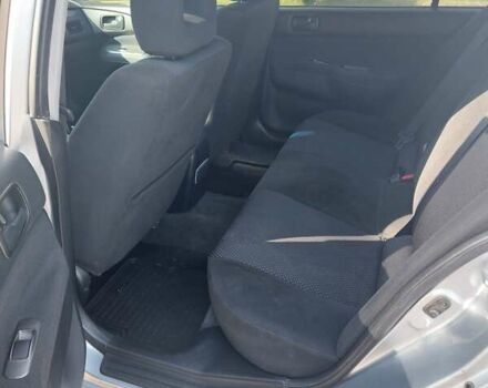 Серый Мицубиси Лансер, объемом двигателя 1.6 л и пробегом 117 тыс. км за 3980 $, фото 3 на Automoto.ua