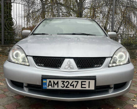 Сірий Міцубісі Lancer, об'ємом двигуна 1.59 л та пробігом 219 тис. км за 4500 $, фото 1 на Automoto.ua