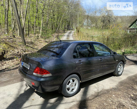 Сірий Міцубісі Lancer, об'ємом двигуна 1.6 л та пробігом 219 тис. км за 5000 $, фото 1 на Automoto.ua