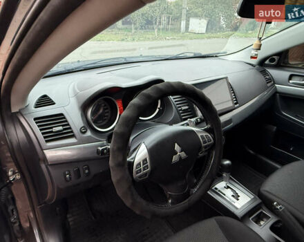 Сірий Міцубісі Lancer, об'ємом двигуна 2 л та пробігом 92 тис. км за 8200 $, фото 12 на Automoto.ua