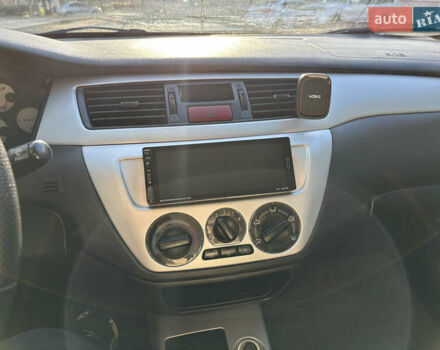 Серый Мицубиси Лансер, объемом двигателя 1.6 л и пробегом 193 тыс. км за 4000 $, фото 16 на Automoto.ua