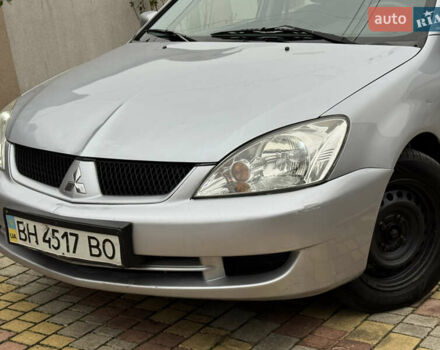 Сірий Міцубісі Lancer, об'ємом двигуна 1.6 л та пробігом 221 тис. км за 3650 $, фото 5 на Automoto.ua