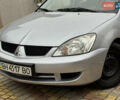 Сірий Міцубісі Lancer, об'ємом двигуна 1.6 л та пробігом 221 тис. км за 3650 $, фото 5 на Automoto.ua