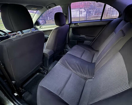Сірий Міцубісі Lancer, об'ємом двигуна 1.5 л та пробігом 239 тис. км за 4900 $, фото 7 на Automoto.ua