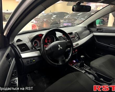 Серый Мицубиси Лансер, объемом двигателя 1.5 л и пробегом 241 тыс. км за 6400 $, фото 8 на Automoto.ua