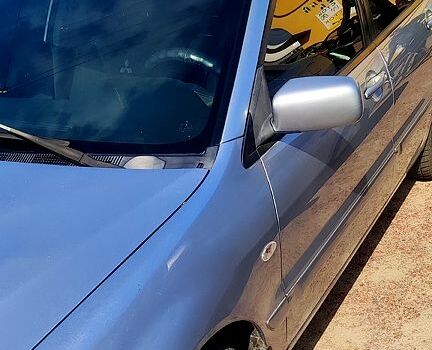 Серый Мицубиси Лансер, объемом двигателя 1.6 л и пробегом 212 тыс. км за 4000 $, фото 3 на Automoto.ua