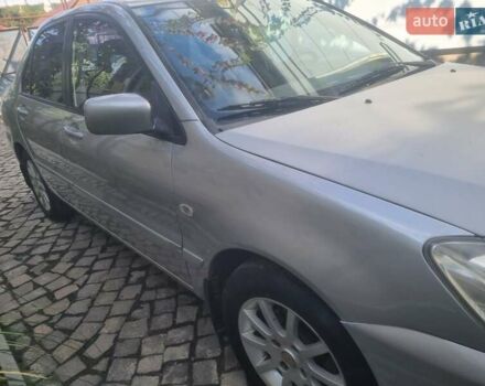 Сірий Міцубісі Lancer, об'ємом двигуна 1.6 л та пробігом 290 тис. км за 3850 $, фото 11 на Automoto.ua