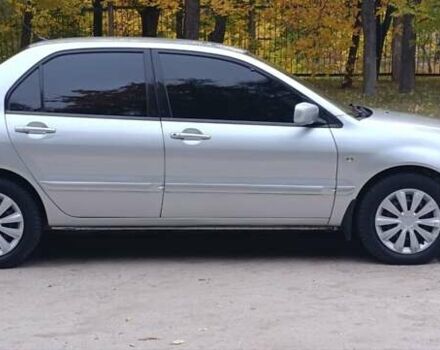 Сірий Міцубісі Lancer, об'ємом двигуна 1.6 л та пробігом 176 тис. км за 4999 $, фото 9 на Automoto.ua