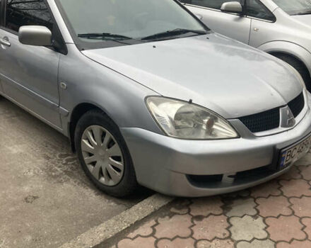 Сірий Міцубісі Lancer, об'ємом двигуна 1.58 л та пробігом 211 тис. км за 4400 $, фото 11 на Automoto.ua