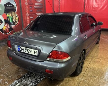 Серый Мицубиси Лансер, объемом двигателя 1.6 л и пробегом 268 тыс. км за 4600 $, фото 5 на Automoto.ua