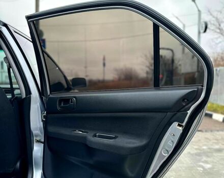 Серый Мицубиси Лансер, объемом двигателя 1.6 л и пробегом 165 тыс. км за 4000 $, фото 8 на Automoto.ua