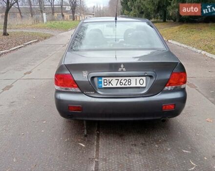 Серый Мицубиси Лансер, объемом двигателя 1.58 л и пробегом 205 тыс. км за 3300 $, фото 2 на Automoto.ua